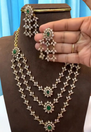 Beautiful 3 layered short necklace with diamond look and green stones